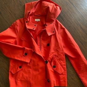 Red rain jacket.